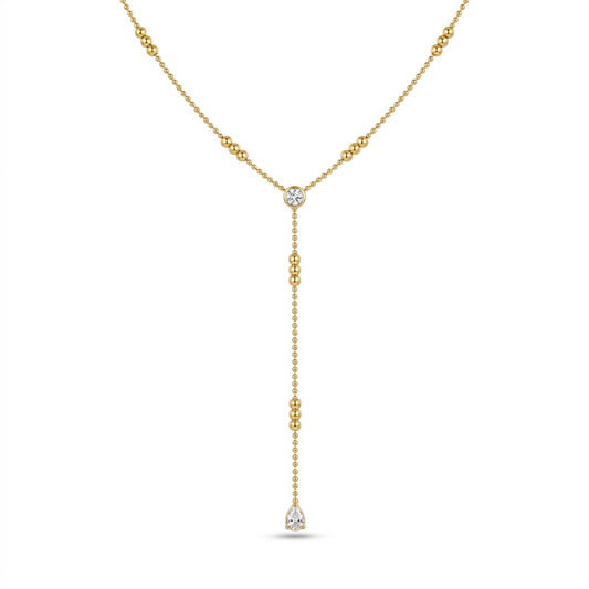 A gold-plated stainless steel chain for women in a Y-drop lariat style featuring delicate beads and crystal accents