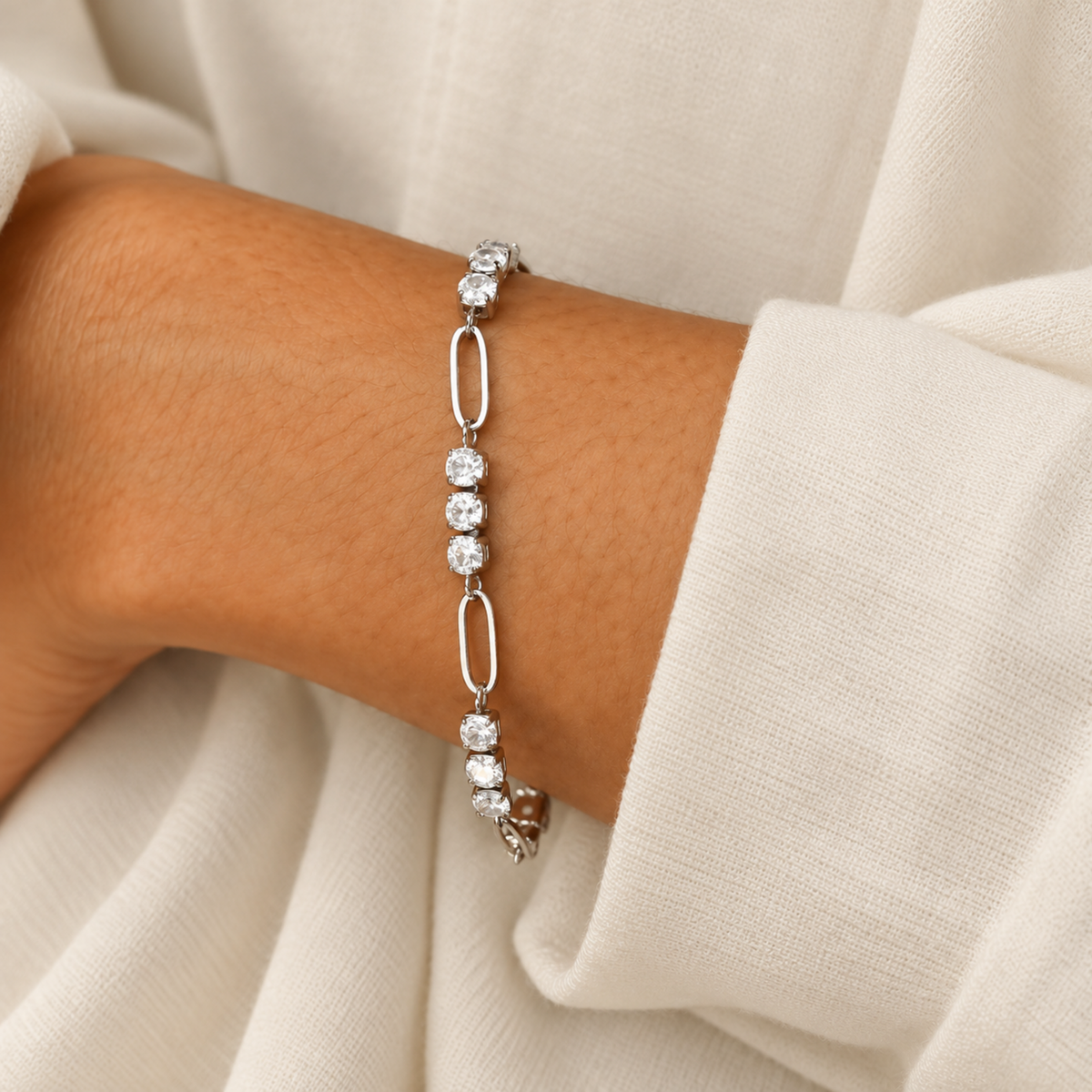 Clara Crystal Link Bracelet with sparkling clear crystal accents in silver, on a model