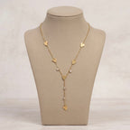 A gold-plated stainless steel Y-shaped chain necklace for women featuring minimalist heart charms and small round crystals