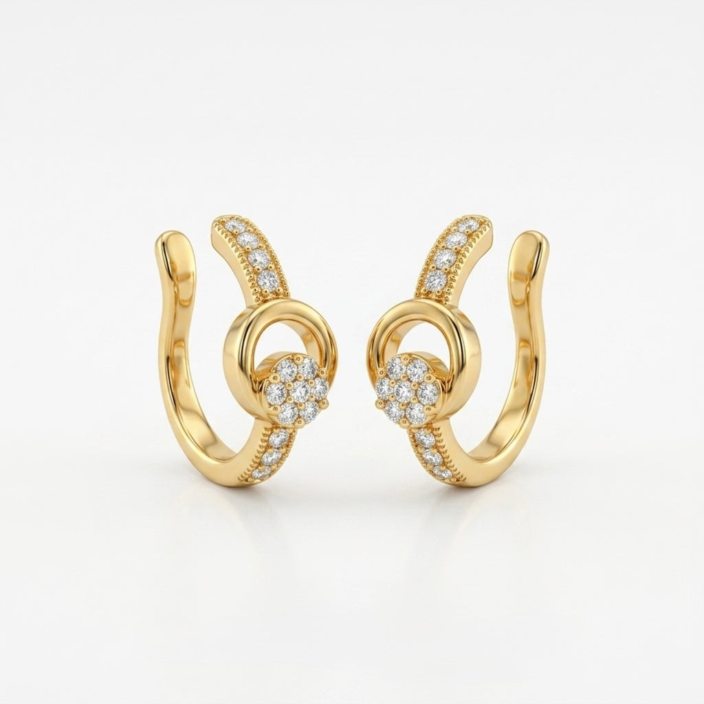 A pair of gold-plated ear cuffs for women featuring five brilliant-cut stones, shown on a white surface