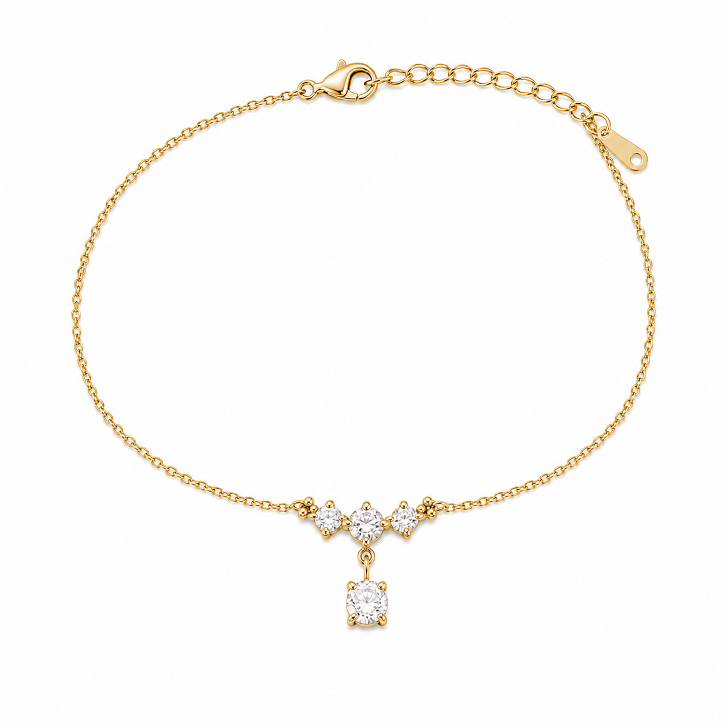 A delicate gold-plated ladies bracelet featuring a cluster of four brilliant-cut crystals and a dangling drop stone