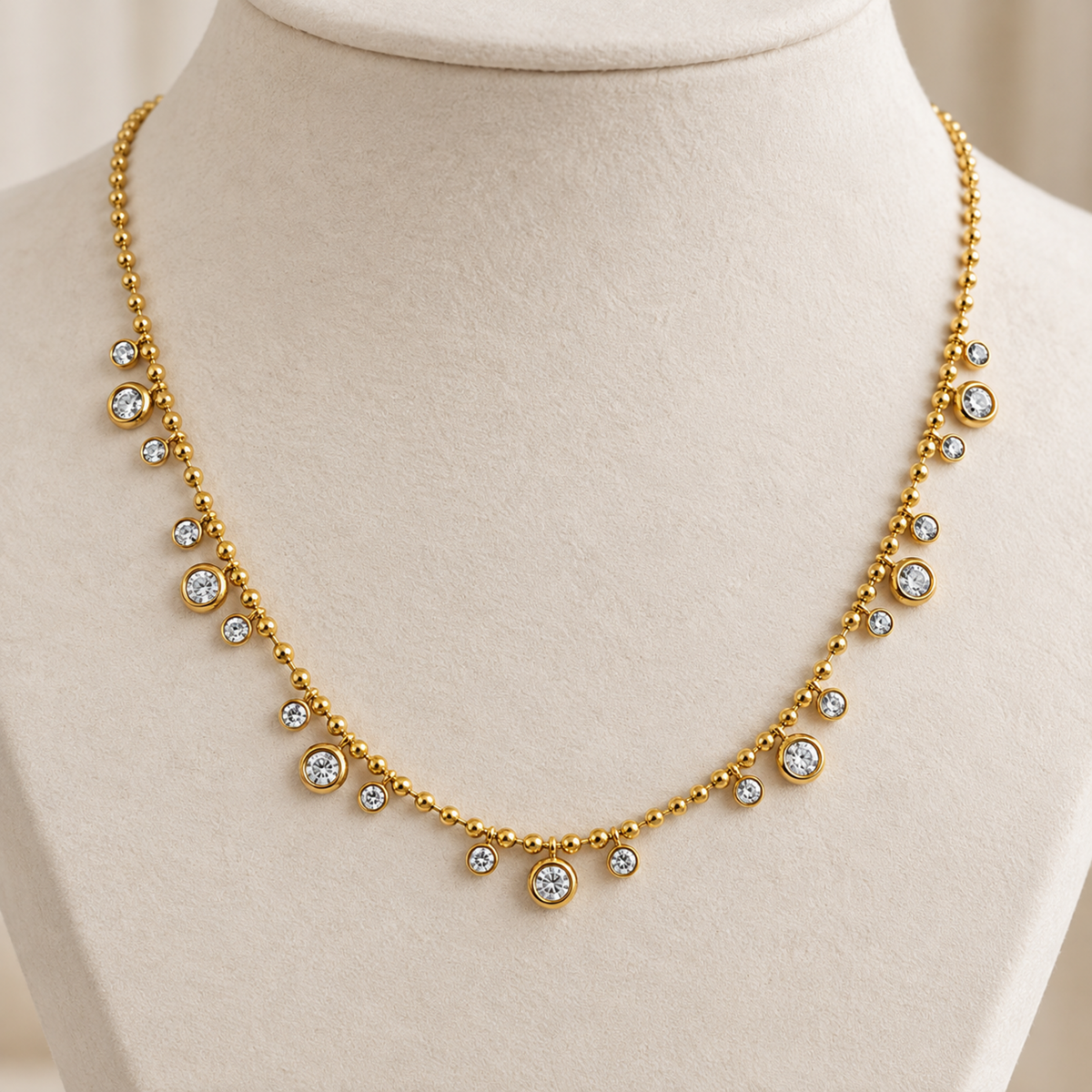 Aveline gold crystal necklace for women with beaded chain and sparkling round crystal charms displayed