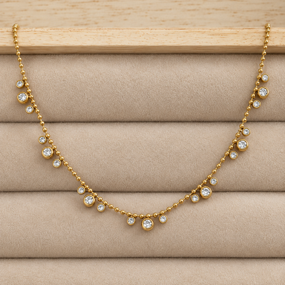 Aveline gold crystal necklace for women with beaded chain and sparkling round crystal charms 