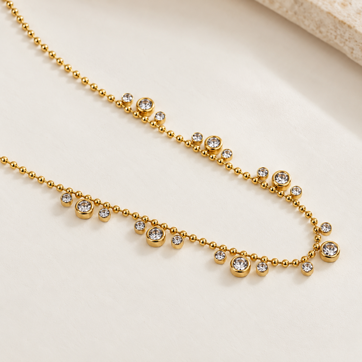 Aveline gold crystal necklace for women with beaded chain and sparkling round crystal charms