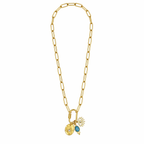 A gold-plated stainless steel chain for women featuring paperclip links and a carabiner clasp with three hanging charms, including a turquoise stone and an evil eye.