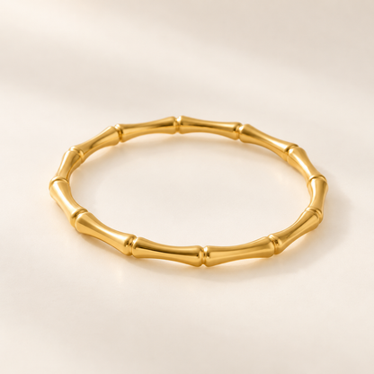Bamboo Gold Bangle Bracelet with sculpted, segmented bamboo-inspired links and a gold-plated finish.