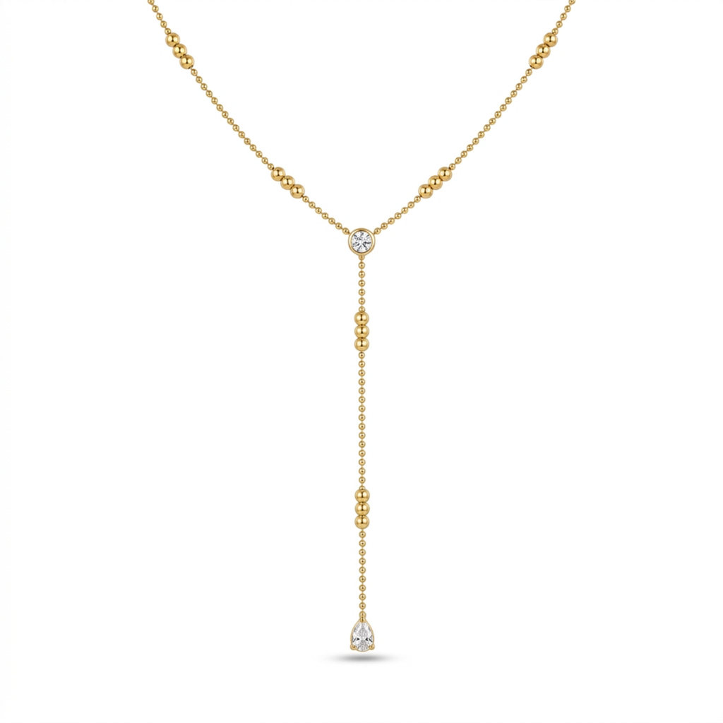 A gold-plated stainless steel chain for women in a Y-drop lariat style featuring delicate beads and crystal accents