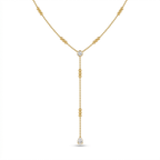 A gold-plated stainless steel chain for women in a Y-drop lariat style featuring delicate beads and crystal accents
