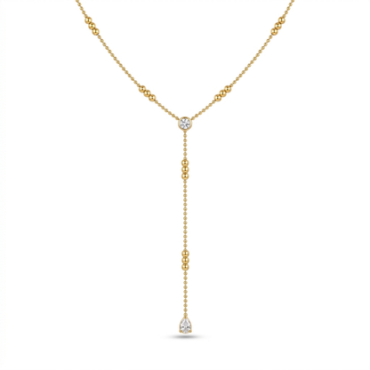 A gold-plated stainless steel chain for women in a Y-drop lariat style featuring delicate beads and crystal accents
