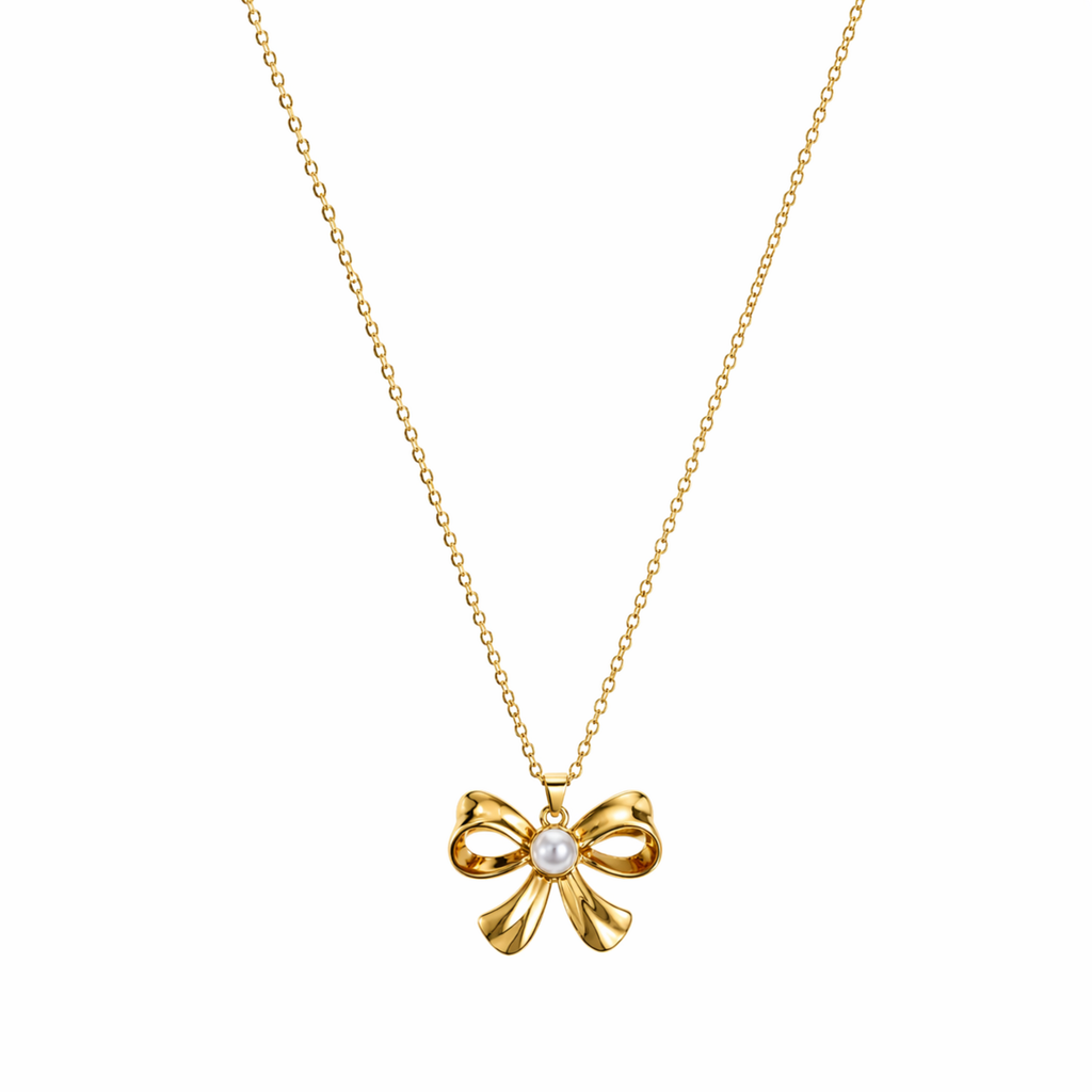 A gold-plated stainless steel chain for women featuring a golden bow pendant with a central pearl, displayed on a white background.
