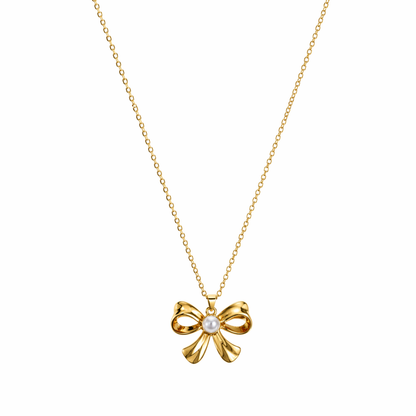 A gold-plated stainless steel chain for women featuring a golden bow pendant with a central pearl, displayed on a white background.