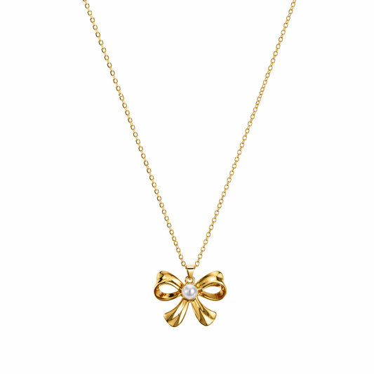 A gold-plated stainless steel chain for women featuring a golden bow pendant with a central pearl, displayed on a white background.