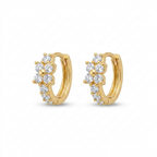 A pair of gold-plated huggie hoop earrings for women featuring a small clear crystal flower design, on a white background