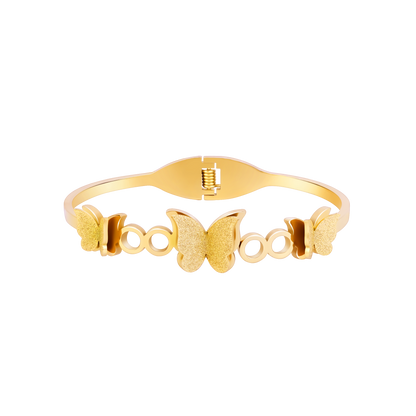 A gold-plated cuff bangle for women featuring three frosted-finish butterfly charms and polished circular links.