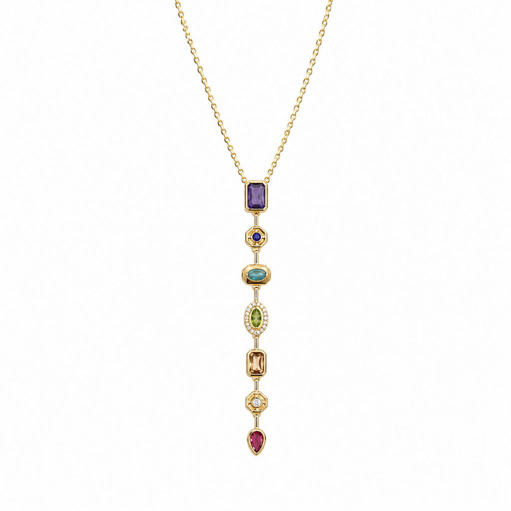 A gold-plated stainless steel chain for women featuring a vertical lariat pendant set with various colorful geometric stones