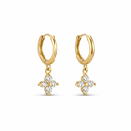 A pair of gold-plated hoop earrings for women featuring a sparkling four-petal crystal clover drop, shown on a white background.