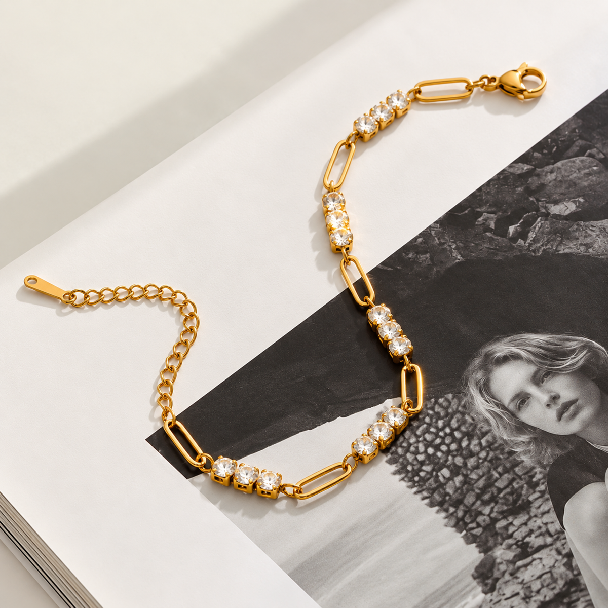 Clara Crystal Link Bracelet with sparkling clear crystal accents in gold displayed