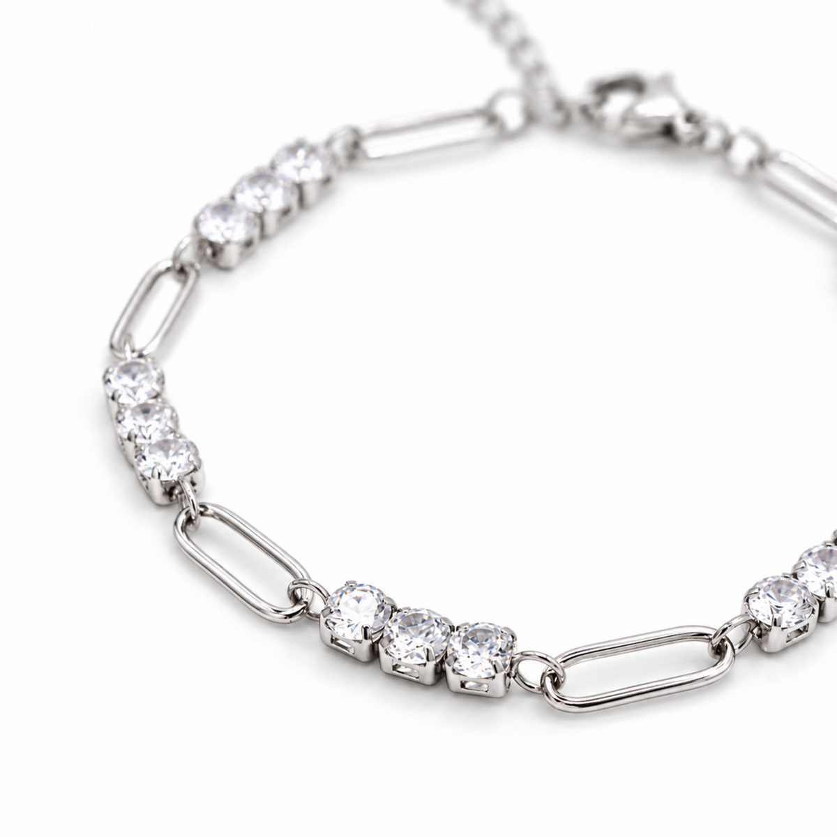 A close-view of Clara Crystal Link Bracelet with sparkling clear crystal accents in silver