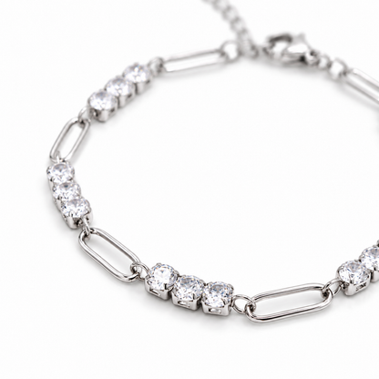 A close-view of Clara Crystal Link Bracelet with sparkling clear crystal accents in silver