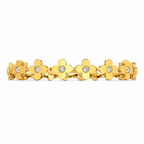 Gold bracelet with floral designs and clear stones on a white background