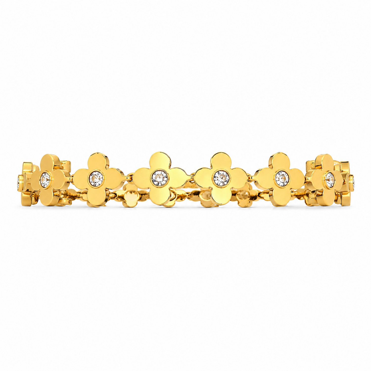 Gold bracelet with floral designs and clear stones on a white background