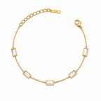 A gold-plated stainless steel chain bracelet for women featuring five clear rectangular baguette stones.