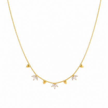 A gold-plated stainless steel chain for women featuring alternating gold heart charms and crystal floral clusters