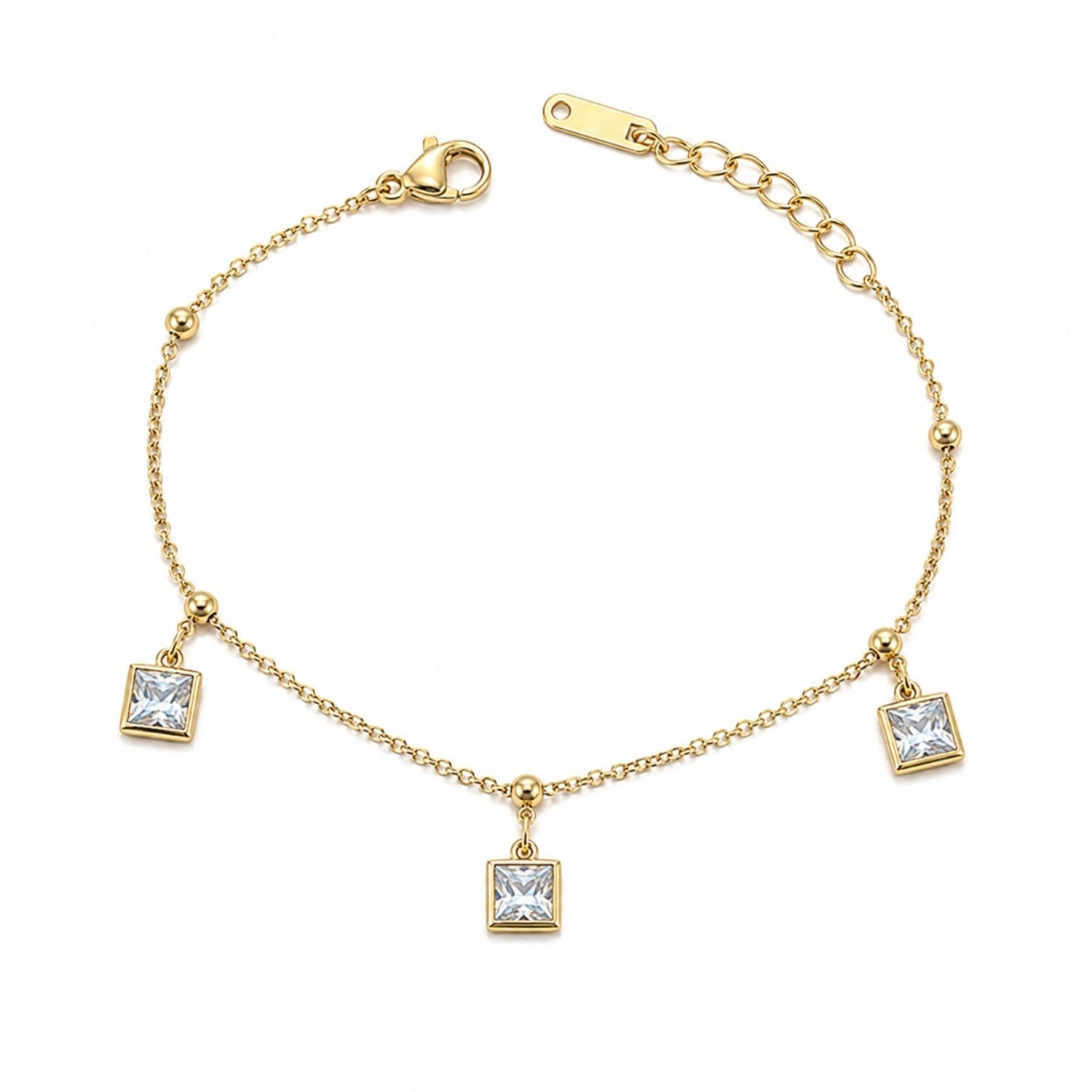 Gold bracelet with square crystal charms on a white background