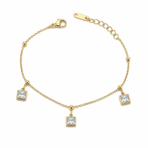 Gold bracelet with square crystal charms on a white background
