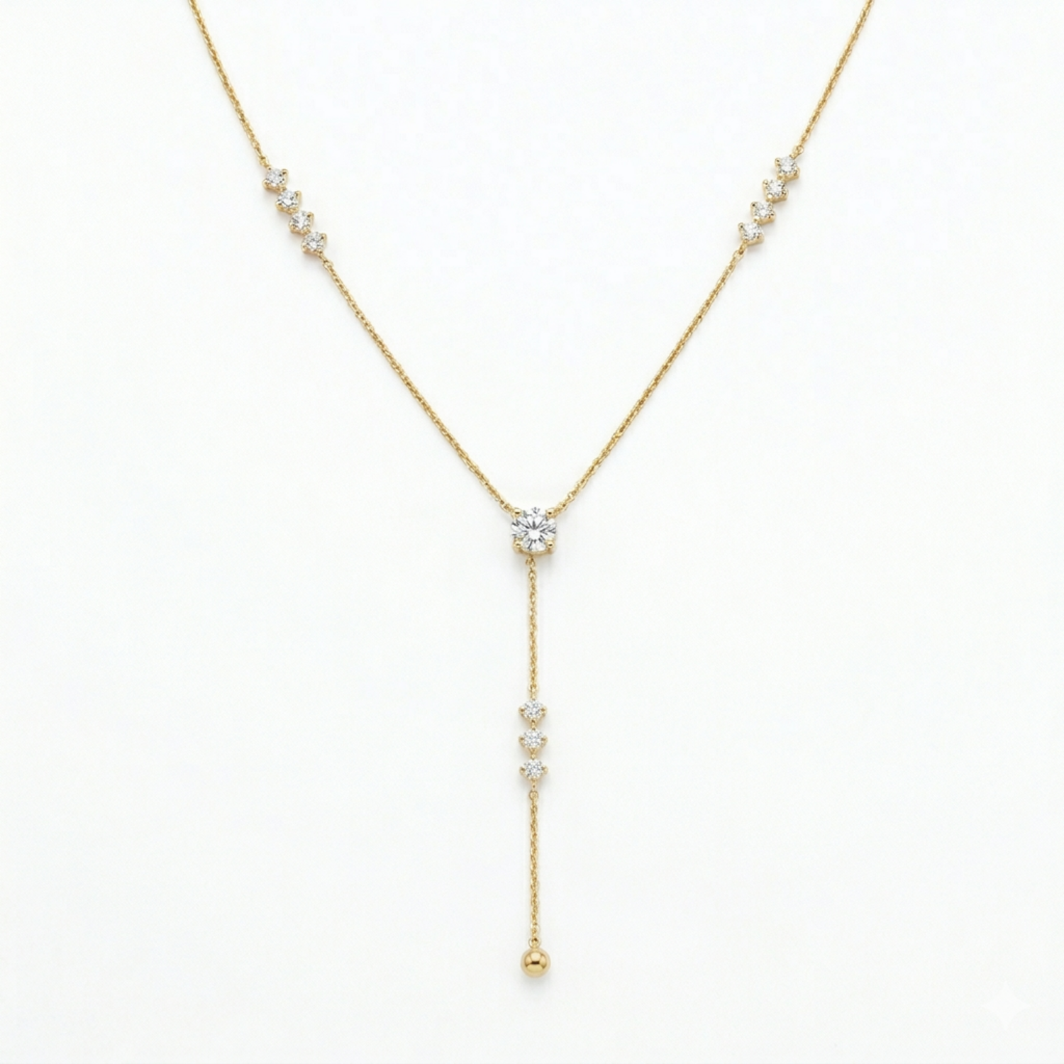 A gold-plated stainless steel chain for women featuring a Y-drop design with multiple crystal accents and a gold bead finish