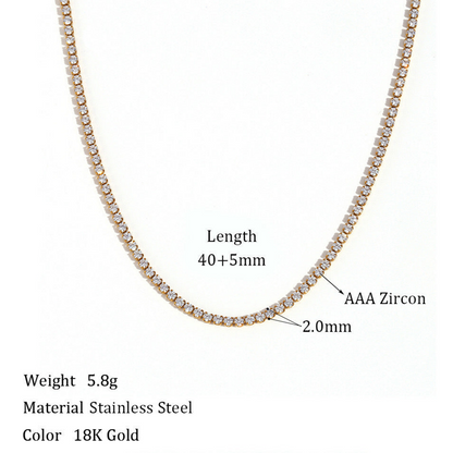 A gold tennis necklace on a white background with dimensions