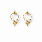 A pair of gold-plated earrings for women featuring a detailed dragonfly charm and three white pearls, shown on a white background.
