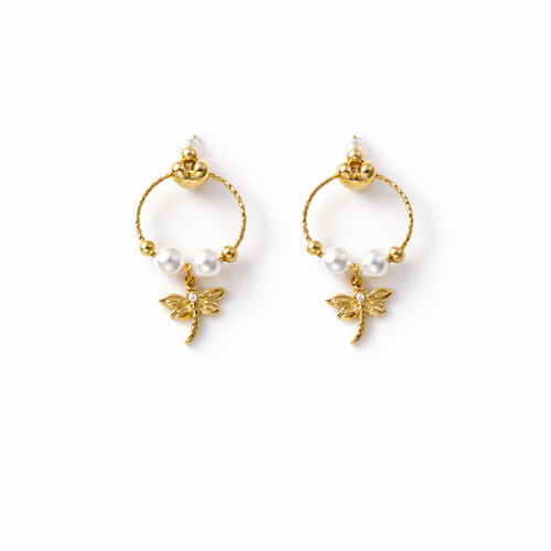 A pair of gold-plated earrings for women featuring a detailed dragonfly charm and three white pearls, shown on a white background.