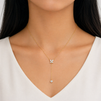 A gold-plated stainless steel chain for women featuring a crystal butterfly lariat design with a plunging drop and solitaire stone, shown on a model