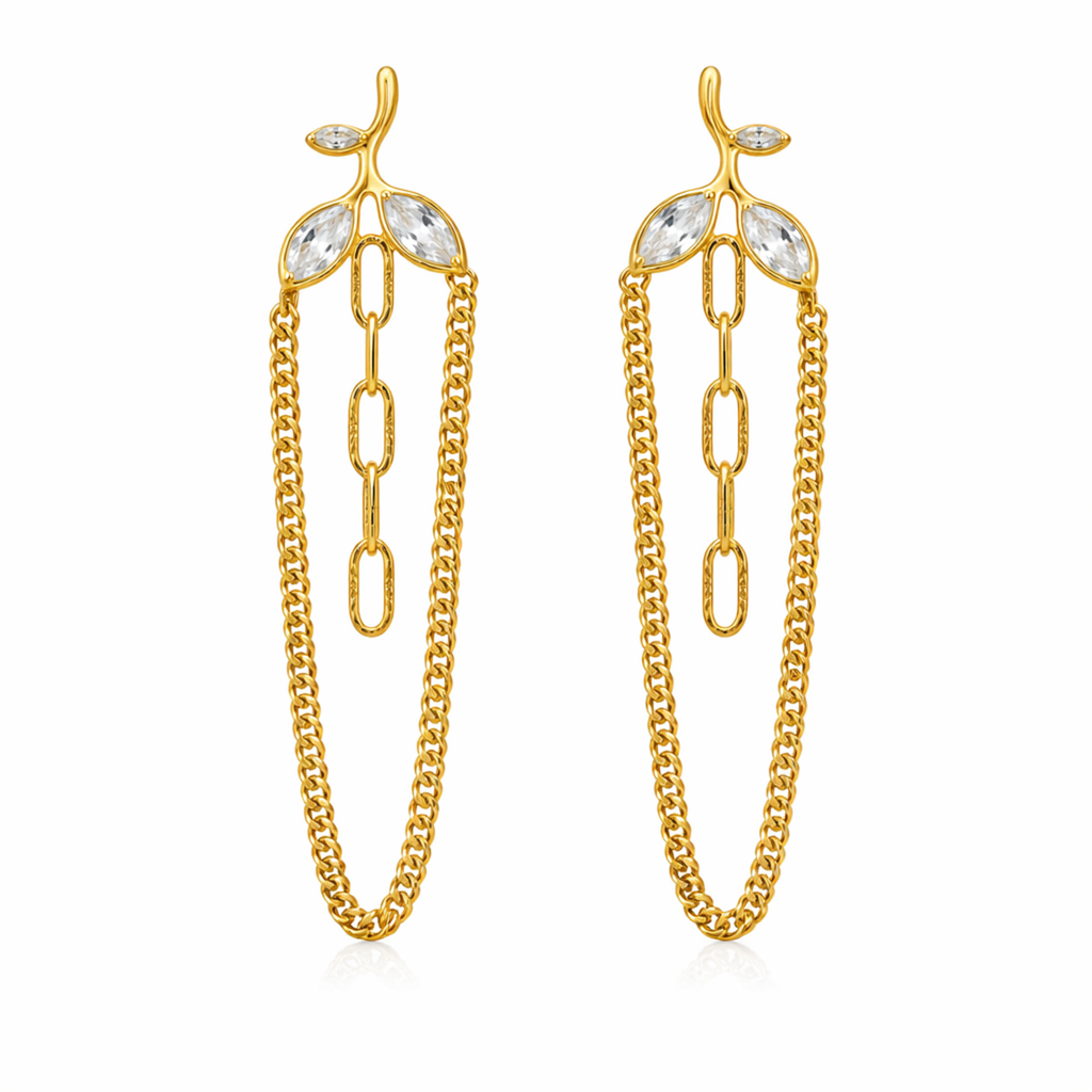 A pair of gold-plated long earrings for women featuring a three-leaf crystal vine that suspends a cascading gold curb chain loop and central paperclip links.