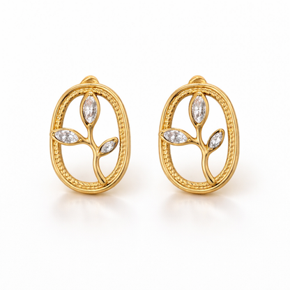 A pair of gold-plated oval stud earrings for women featuring an branch design with three marquise crystal leaves, shown on a white background