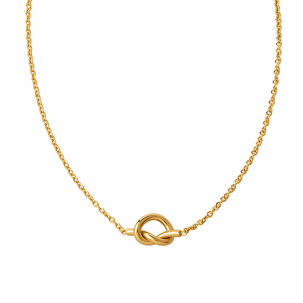 A gold-plated stainless steel chain for women featuring a polished, sculptural knot pendant on a delicate link chain, on a white background.
