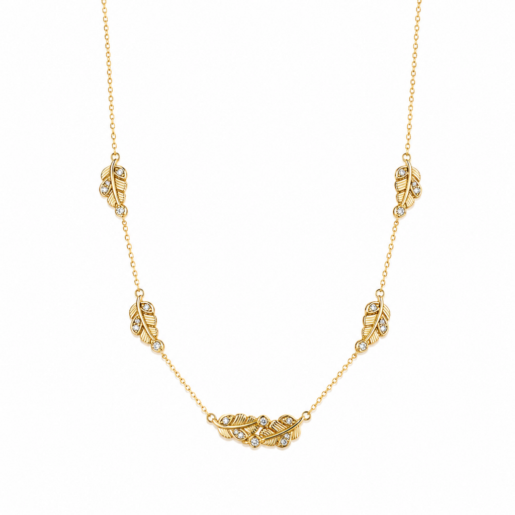 A gold-plated stainless steel chain for women featuring five crystal-accented feather station charms