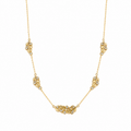 A gold-plated stainless steel chain for women featuring five crystal-accented feather station charms