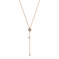 A gold-plated stainless steel Y-shaped necklace for women featuring a small crystal flower pendant and a dangling chain with gold beads, shown on a white background