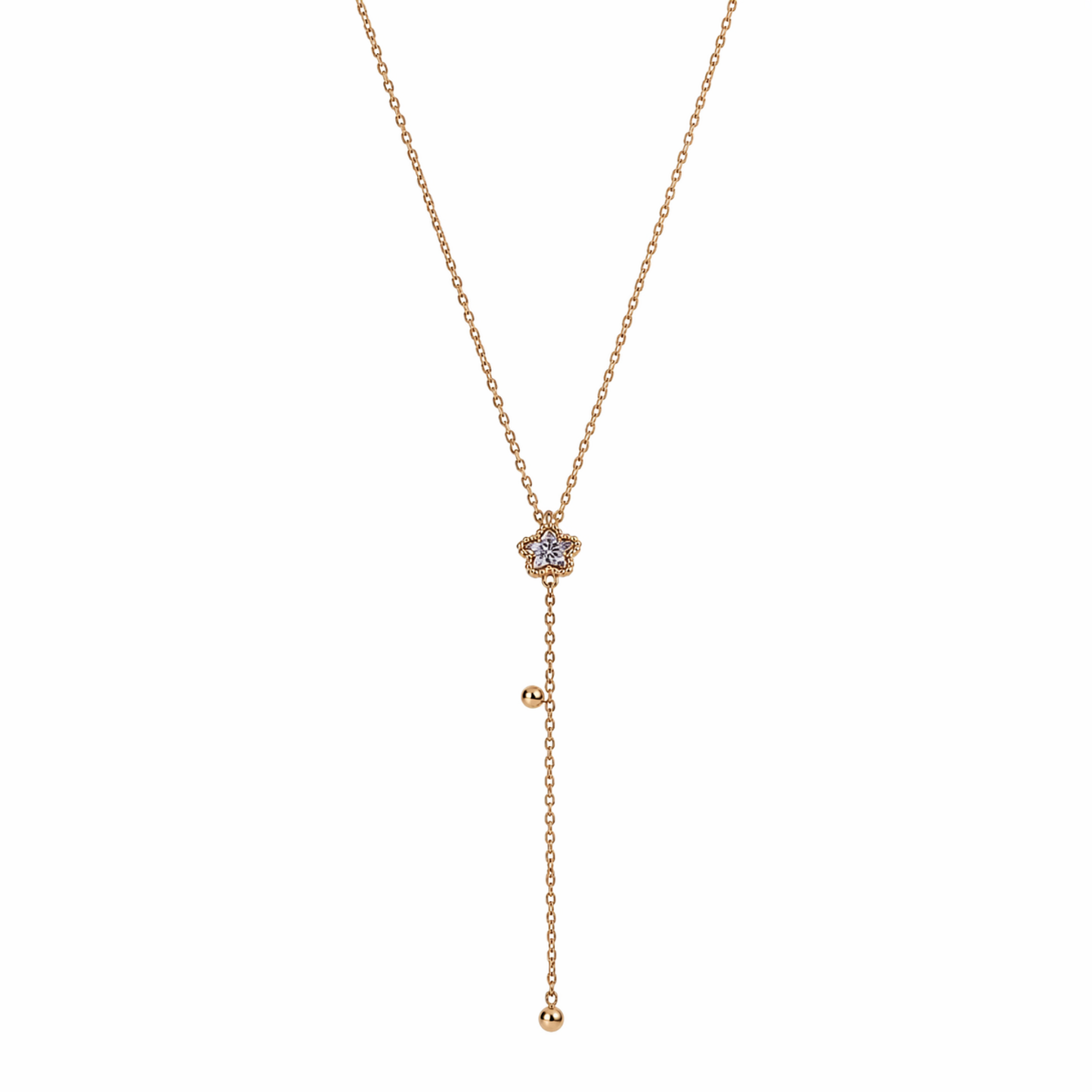 A gold-plated stainless steel Y-shaped necklace for women featuring a small crystal flower pendant and a dangling chain with gold beads, shown on a white background