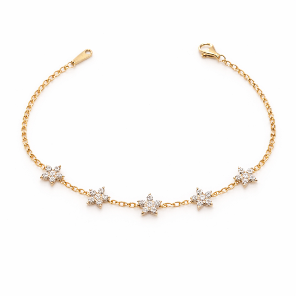 A delicate gold-plated chain bracelet for women featuring five star-shaped floral crystal stations, shown on a clean white background