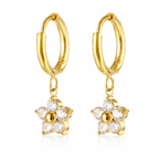 A pair of gold-plated hoop earrings for women featuring a dangling flower-shaped charm made of clear crystals, shown on a white background.