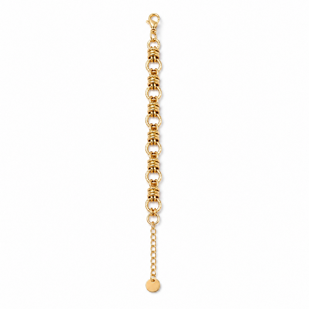 A close-view of a gold-plated chain bracelet for women featuring thick polished links and textured coiled metal stations.