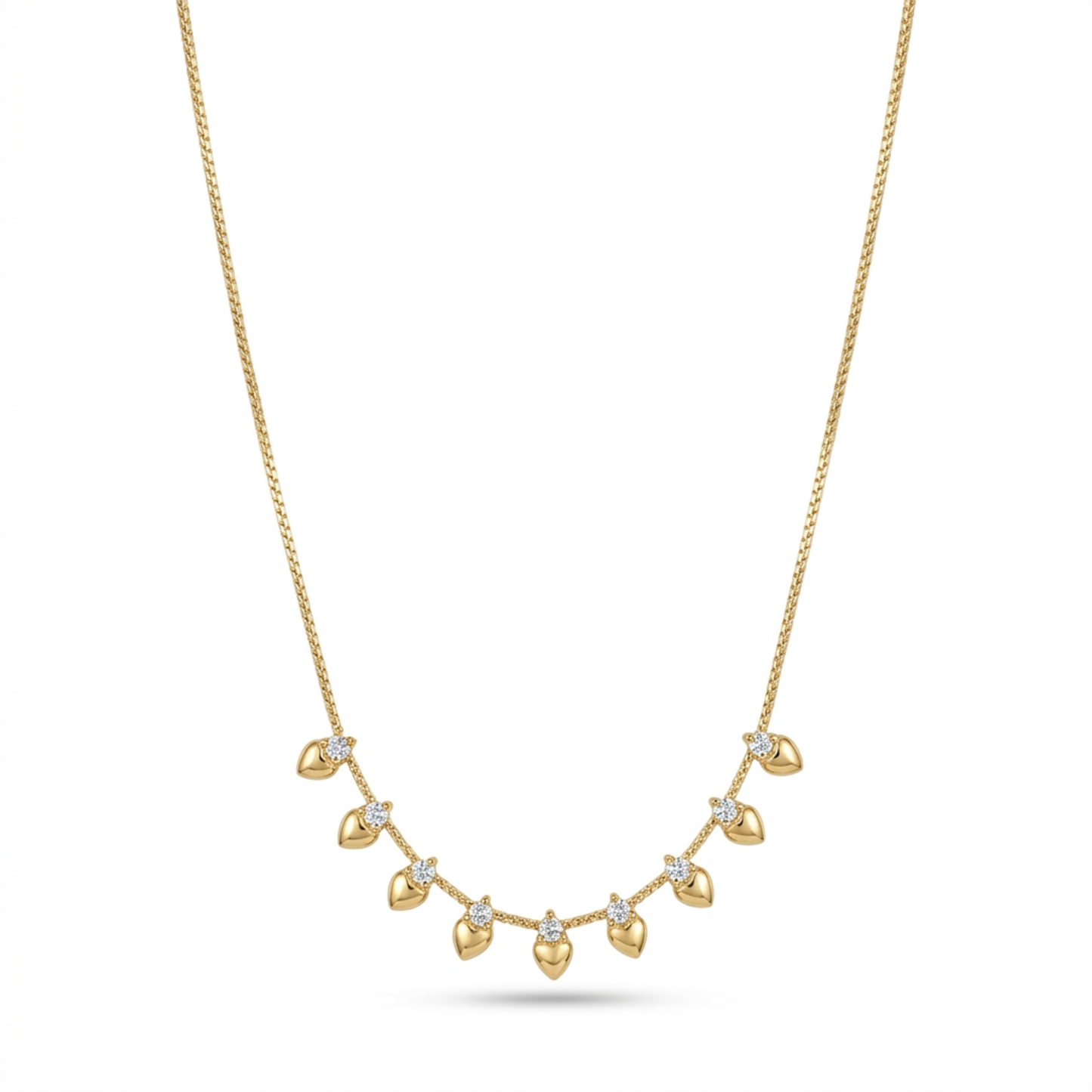 A gold-plated stainless steel chain for women featuring a fringe of nine golden hearts each accented with a small crystal