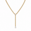 A gold-plated stainless steel chain for women in a Y-drop lariat style featuring a vine-like beaded link and teardrop crystal