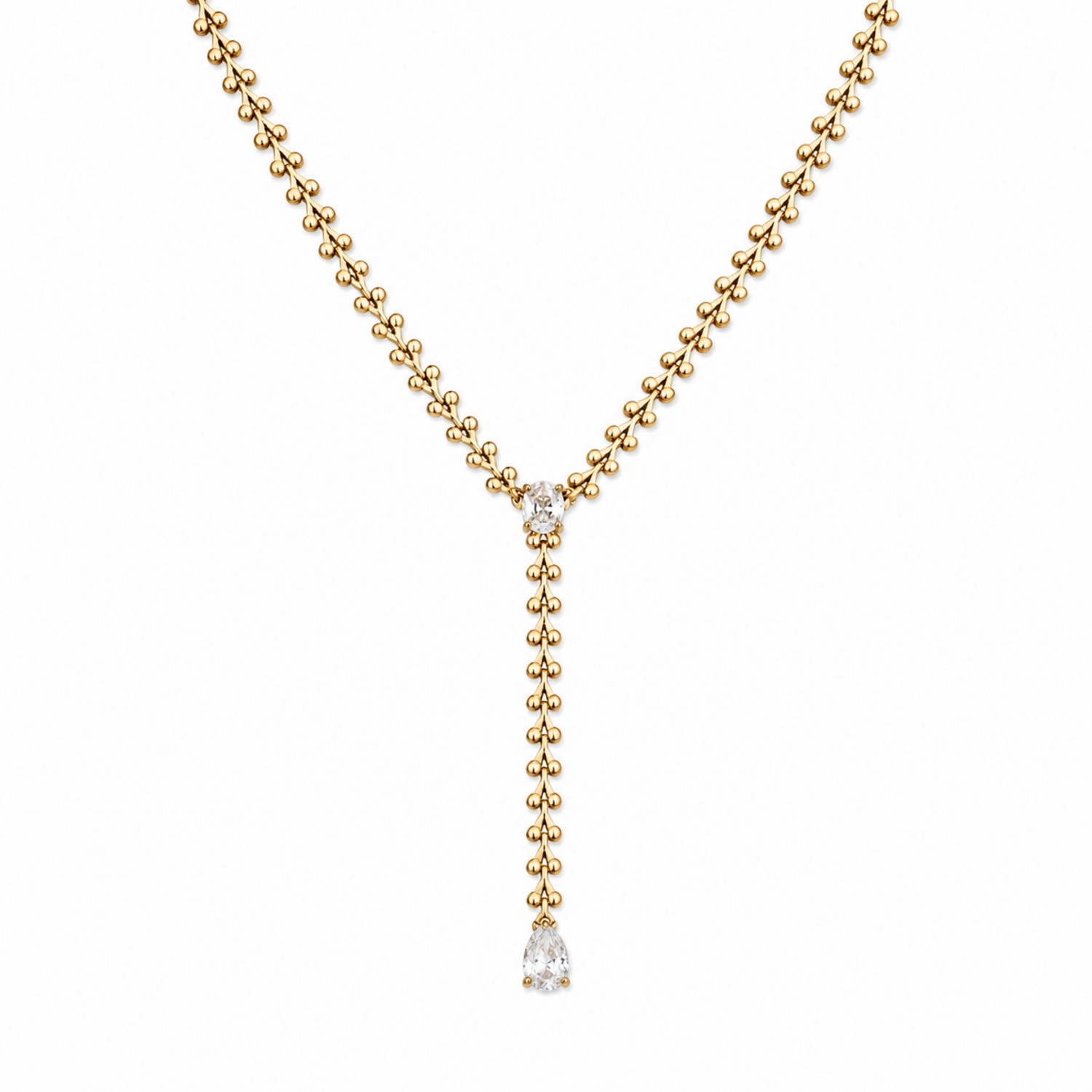 A gold-plated stainless steel chain for women in a Y-drop lariat style featuring a vine-like beaded link and teardrop crystal
