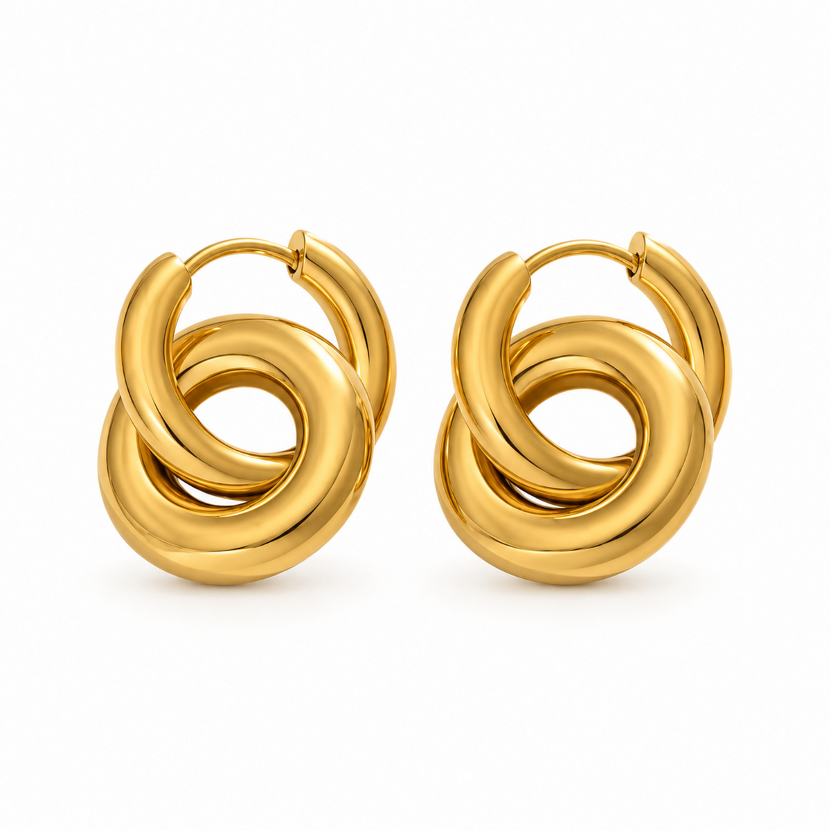 A pair of gold huggie hoop earrings with a thick, polished knot-like twist design, shown on a clean white background.