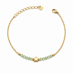 A delicate gold-plated stainless steel chain bracelet for women featuring pale-green faceted jadeite beads and a central gold star charm.