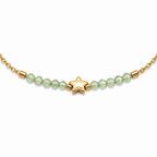 A close-view of a delicate gold-plated stainless steel chain bracelet for women featuring pale-green faceted jadeite beads and a central gold star charm.